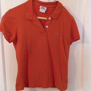 Orange Lacoste short sleeve polo shirt